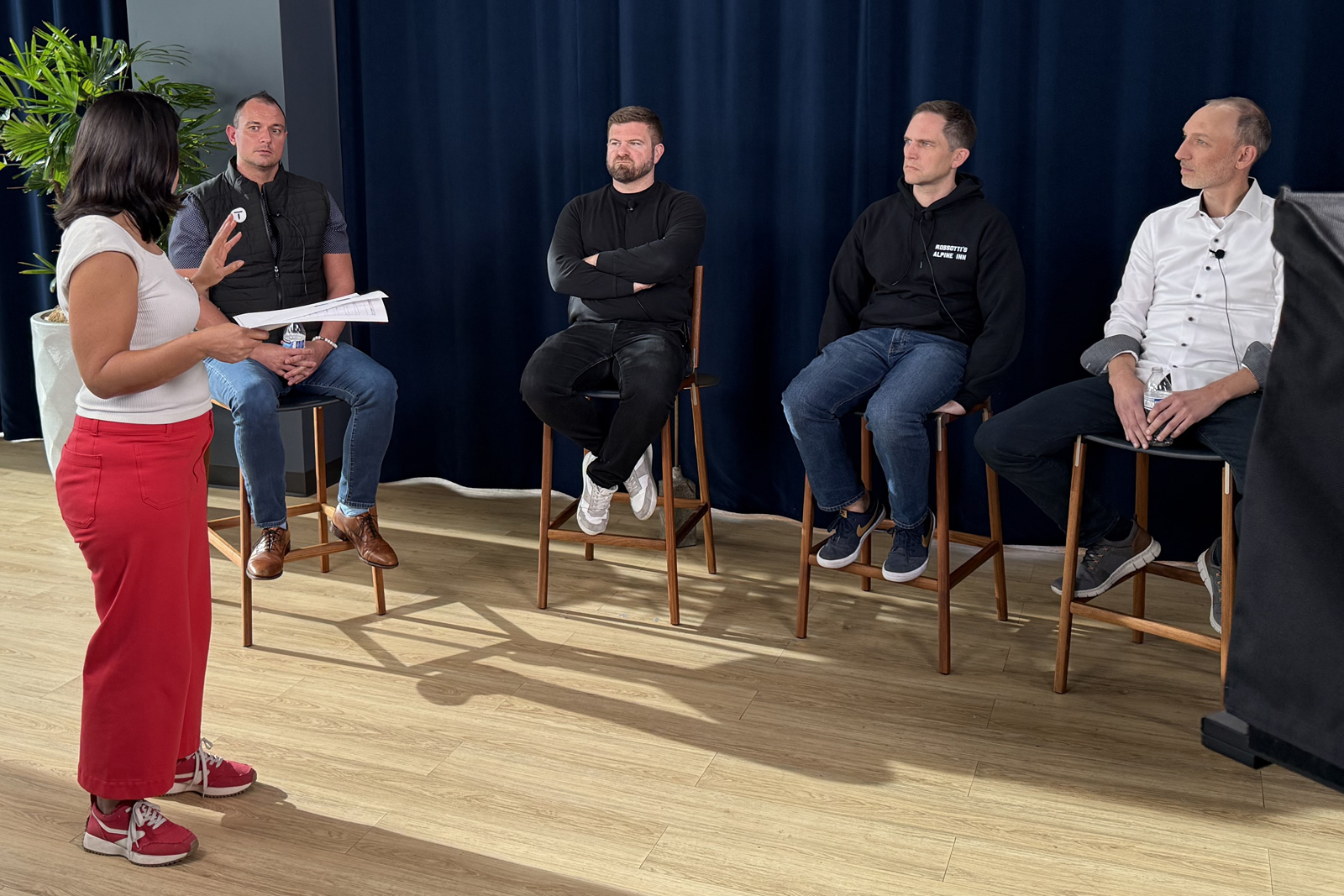 Behind-the-scenes photo of an Ingenuity Design agency team member running a live virtual event shoot for a strategic event client.