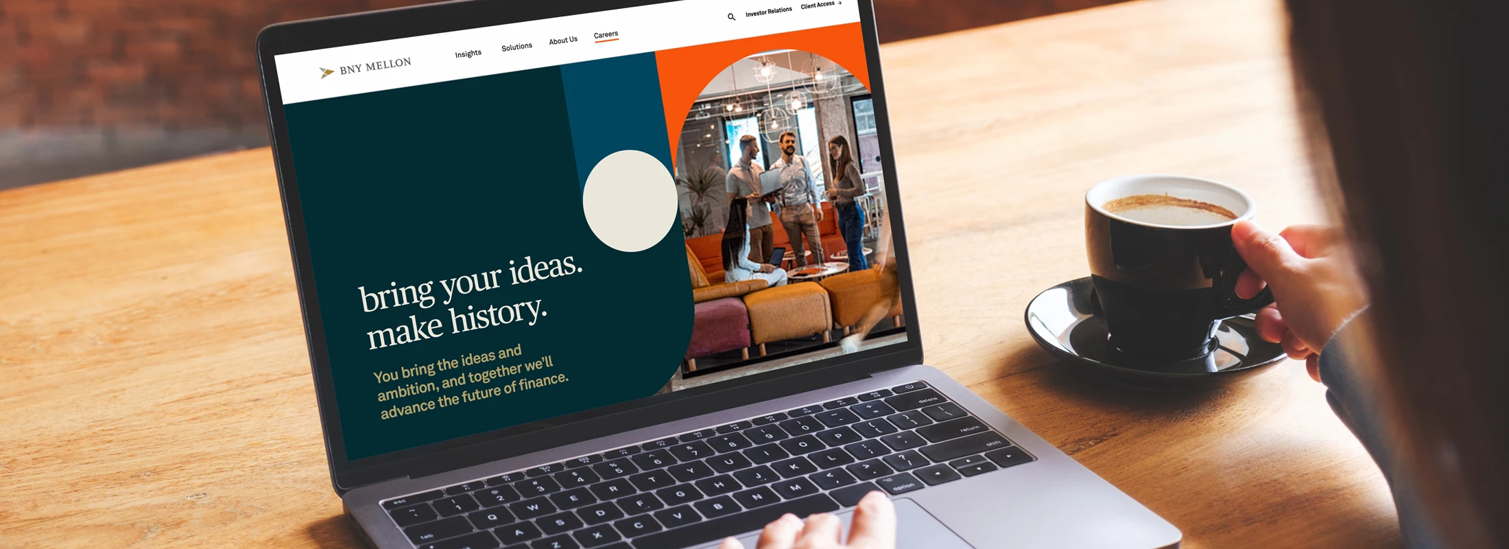photo of a person looking at the BNY Mellon website on a laptop