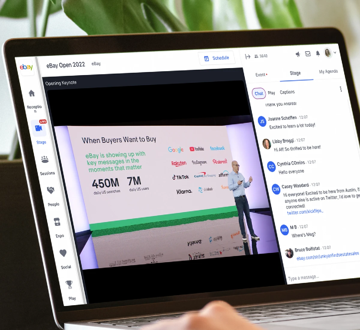 A laptop displaying the eBay Open 2022 virtual event main stage keynote broadcast next to an active live chat stream window.